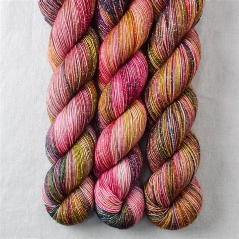 Miss babs hand dyed yarns - We're celebrating the golden 50th anniversary of the Maryland Sheep &amp; Wool Festival with this soft rose gold with red and gold speckles. It's a perfect contrast for rich, warm jewel tones.You can see all the yarns dyed in this colorway by visiting our Golden Anniversary colorway collection.This yarn is speckled: it